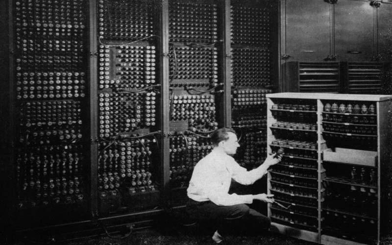 Engineer Replaces ENIAC Vacuum Tube | Glenn Beck replaces a bad tube in the ENIAC. Replacing a tube meant checking more than 17,000 possibilities. (U.S. Army photo from the archives of the ARL Technical Library.)