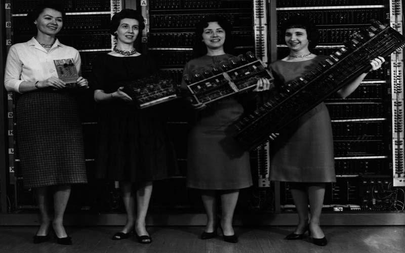 ENIAC Decade Ring Counter | ENIAC component size compared to later models. Left: Patsy Simmers, holding ENIAC board. Center Left: Gail Taylor, holding EDVAC board. Center Right: Milly Beck, holding ORDVAC board. Right: Norma Stec, holding BRLESC-I board. (U.S. Army photo from the archives of the ARL Technical Library.)